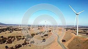 Aerial footage of wind farm on hills