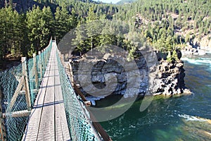 Aerial Footpath crossing the Wild Kootenai River in mountains of Northwestern Montana