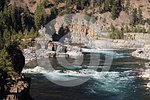 Aerial Footpath crossing the Wild Kootenai River in mountains of Northwestern Montana