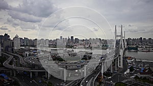 Aerial freeway busy city rush hour heavy traffic jam highway Shanghai.