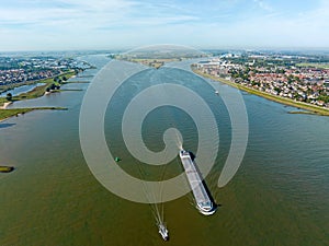 Aerial from a freighter cruising on the river Boven Merwede near Werkendam in the Netherlands