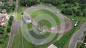 Aerial of fresh green soccer field. Football field on sunny, summer morning. Active sport concept