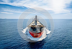 Aerial front view of a bulk carrier cargo vessel photo