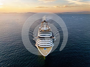 Aerial front view of a cruise ship traveling over the ocean