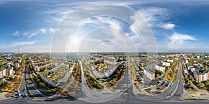 aerial full seamless spherical hdri 360 panorama view above road junction with traffic in city overlooking of residential area of