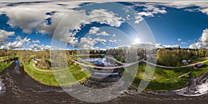 aerial full seamless spherical hdri 360 panorama view over dam lock sluice on lake impetuous waterfall with beautiful clouds in