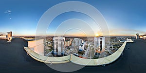 Aerial full seamless spherical panorama 360 angle degrees view from roof of multi-storey building with view of residential quarter