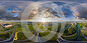 aerial full spherical seamless hdr 360 panorama over huge road junction of freeway at height of 100 meters at susnset in photo