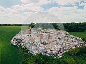 Aerial: Garbage dump on the outskirts of the forest