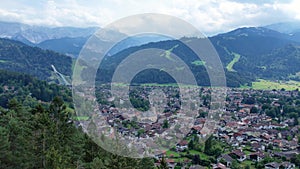 Aerial of Garmisch Partenkirchen Bavarian village in Alps montains