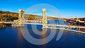 Aerial Golden Hour View of Portage Lake Lift Bridge and Autumn Foliage