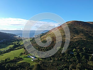 Aerial of the green mountains in the Isle of Arran, Scotland.