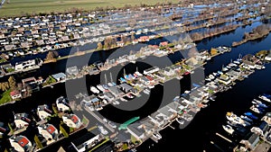Aerial of the harbour of Scheendijk Loosdrechtse Plassen near Breukelen in The Netherlands. Waterways landscape.