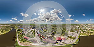 aerial hdri 360 panorama view from great height on buildings, churches, lake and center square of provincial city in