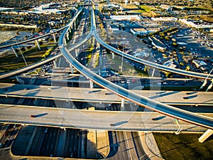 Aerial High View over texas Highway Exchange Overpass Traffic Transportation Urban Sprawl