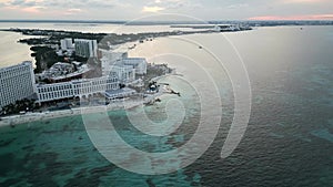 Aerial hight angle sunset above Cancun Mexico travel holiday hotel zone