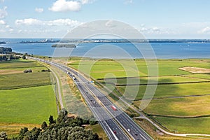 Aerial from the highway A1 near Amsterdam at the IJsselmeer in the Netherlands