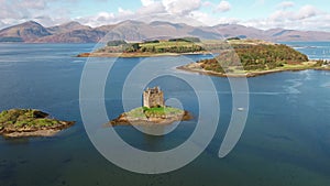 Aerial of the historic castle Stalker in Argyll, Scotland