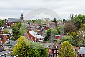 Aerial of historic downtown Lancaster, Pennsylvania with blooming trees photo