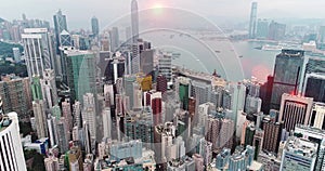 AERIAL. Hong Kong skyline. Hongkong hdr aerial cityscape with sunset sun. Amazing panorama of buildings and sky