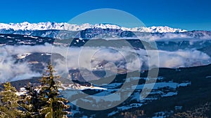 Aerial hyperlapse of the snow covered valley of Giffre in Haute-Savoie with the Criou peak