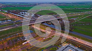 Aerial hyperlapse timelapse of the A2 motorway highway infrastructure by night dusk in the Netherlands. Between Utrecht