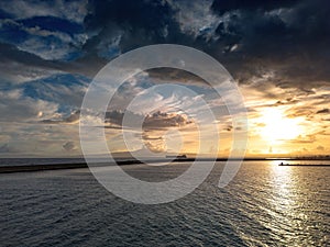 Aerial iconic sunset view over the port of Kalamata seaside city in Messenia, Greece