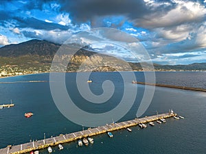 Aerial iconic sunset view over the port of Kalamata seaside city in Messenia, Greece