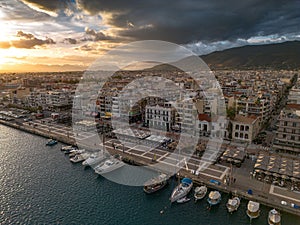 Aerial iconic sunset view over the port of Kalamata seaside city in Messenia, Greece