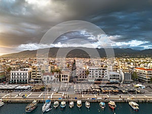 Aerial iconic sunset view over the port of Kalamata seaside city in Messenia, Greece