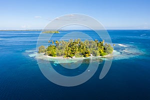 Aerial of Idyllic Tropical Island in Molucca Sea photo