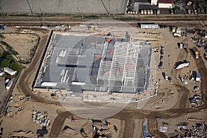 An aerial image of construction of a large box store