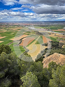 Aerial image of the Corredor del Henares with the town of Taracena and cereal fields in the foreground, the city of Guadalajara photo