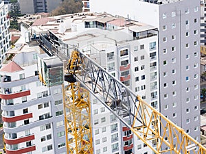 Aerial image of a crane in operation. Building industry structure.