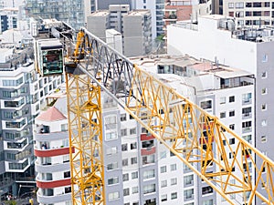 Aerial image of a crane in operation. Building industry structure.