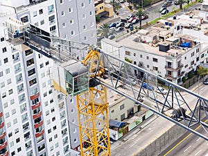 Aerial image of a crane in operation. Building industry structure.