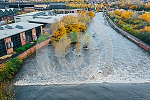 Aerial image of damage caused to offices by River Don, Sheffield, Yorkshire, UK