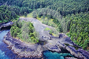 An aerial image of the Ninstints village on Haida Gwaii, BC, Canada