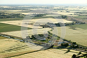 An aerial image of a patchwork of farm fields.