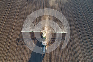 Aerial image of tractor working in field
