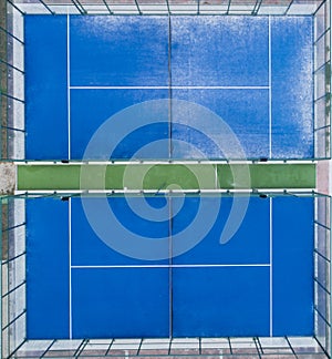 Aerial image of two paddle tennis court