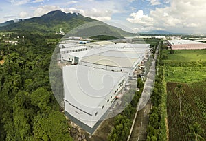 Aerial of an industrial factory compound at the foot of Mt. Makiling in Sto. Tomas, Batangas, Philippines photo