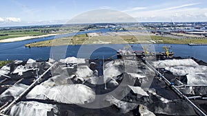 Aerial of industrial harbour with coal ores