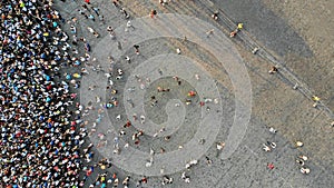 Aerial. Interested crowd of people in one place. Top view