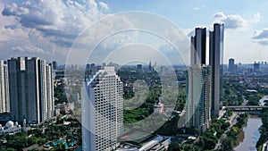 Aerial Jakarta view from above Sudirman street in the morning with building and rush hours view