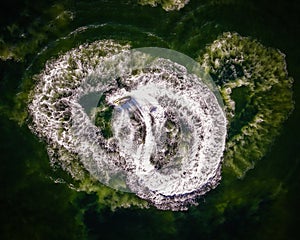 Aerial of Jetskier Making Waves