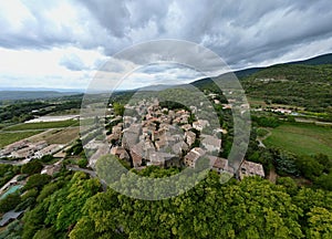 Aerial Journey Over Rustic Vaugines: A Charming Provencal Village in Vaucluse, PACA - Drone Exploration of Town