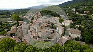 Aerial Journey Over Rustic Vaugines: A Charming Provencal Village in Vaucluse, PACA, Drone Exploration of Town