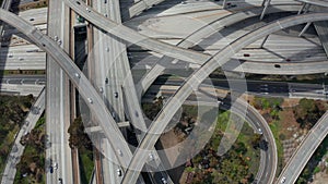 AERIAL: Judge Pregerson Huge Highway Connection showing multiple Roads, Bridges, Viaducts with little car traffic in Los