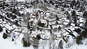 Aerial of the Kanata neighborhood in winter. Suburbian houses covered with snow. Kanata, Ottawa, Ontario, Canada photo